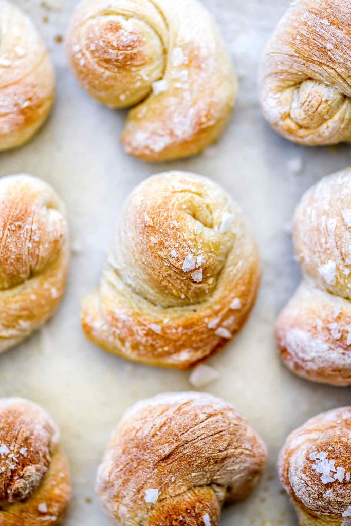 Pizza Dough Knots on baking sheet | foodiecrush.com #garlic #rolls #knots #recipes