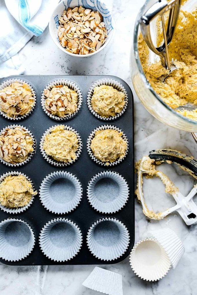 making lemon and almond poppy seed muffins