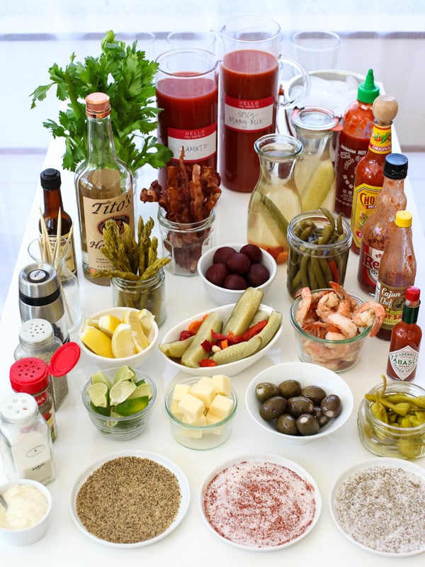 bloody mary ingredients laid out on table