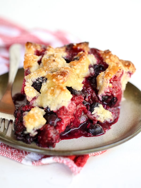 slice of berry pie on a plate