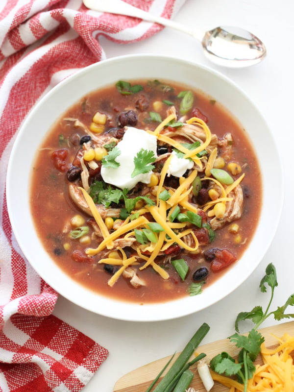 Slow Cooker Chicken Enchilada Soup #recipe on foodiecrush.com