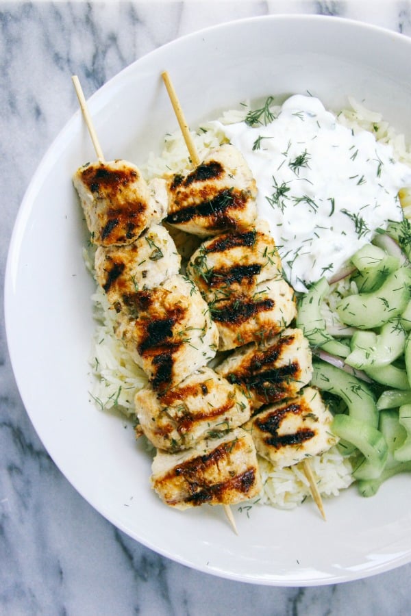 Grilled Chicken Kebab Bowls with Cucumber Salad and Tzatziki from iwillnoteatoysters.com on foodiecrush.com