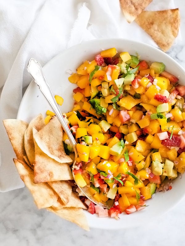 Mango Salsa in large serving bowl with tortilla chips