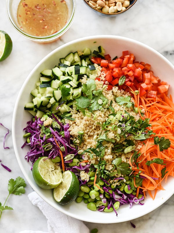 thai quinoa salad ingredients in large bowl