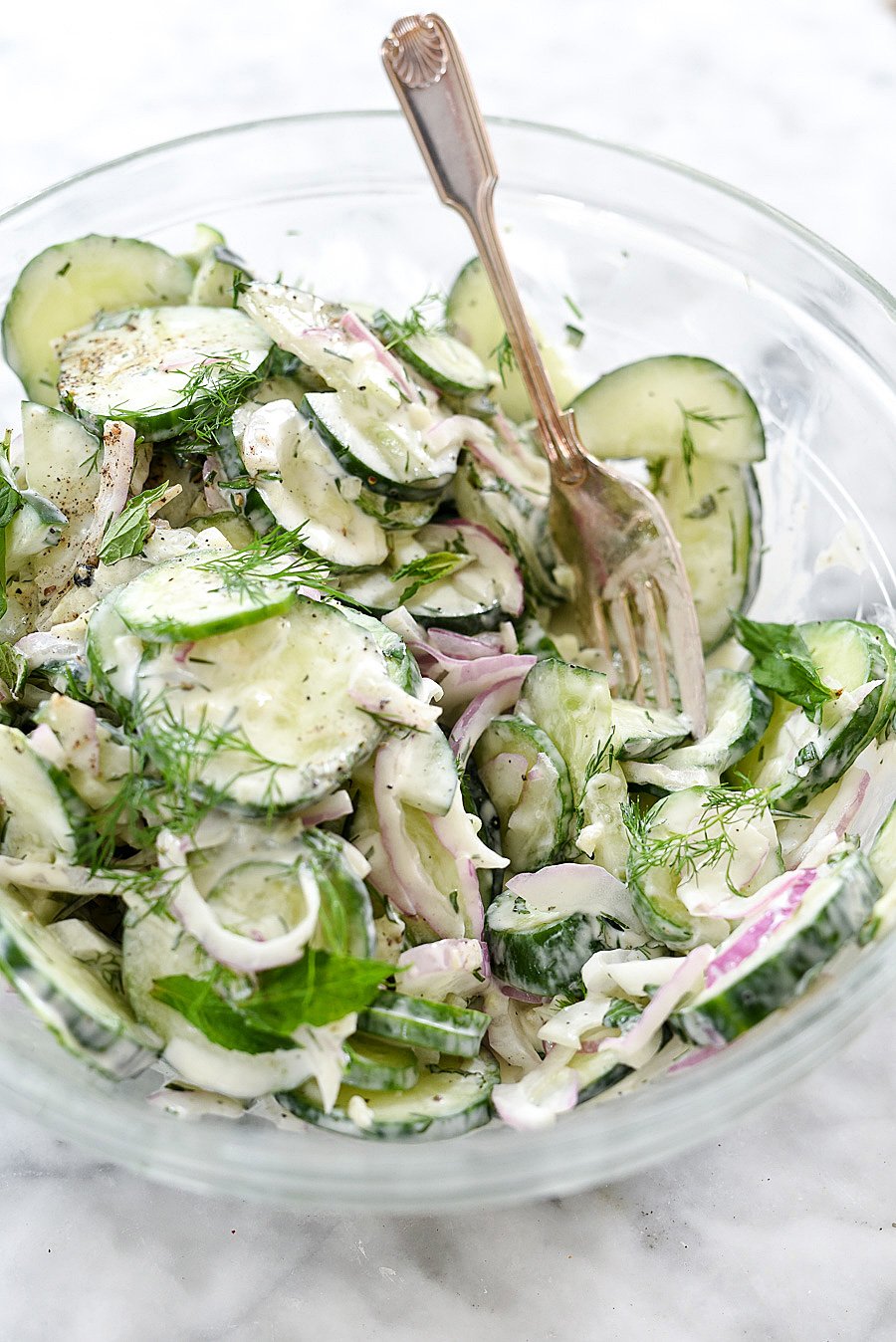 Creamy Yogurt Cucumber Salad Recipe | foodiecrush.com #tzatzikisauce #healthy #garlic