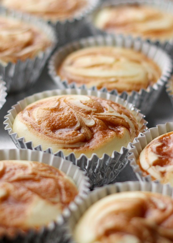 Caramel Swirl Cheesecake Cupcakes from Barefeet In The Kitchen on foodiecrush.com 