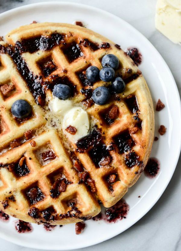 Crispy Bacon Waffles with Bourbon Butter and Blueberry Syrup from howsweeteats.com on foodiecrush.com