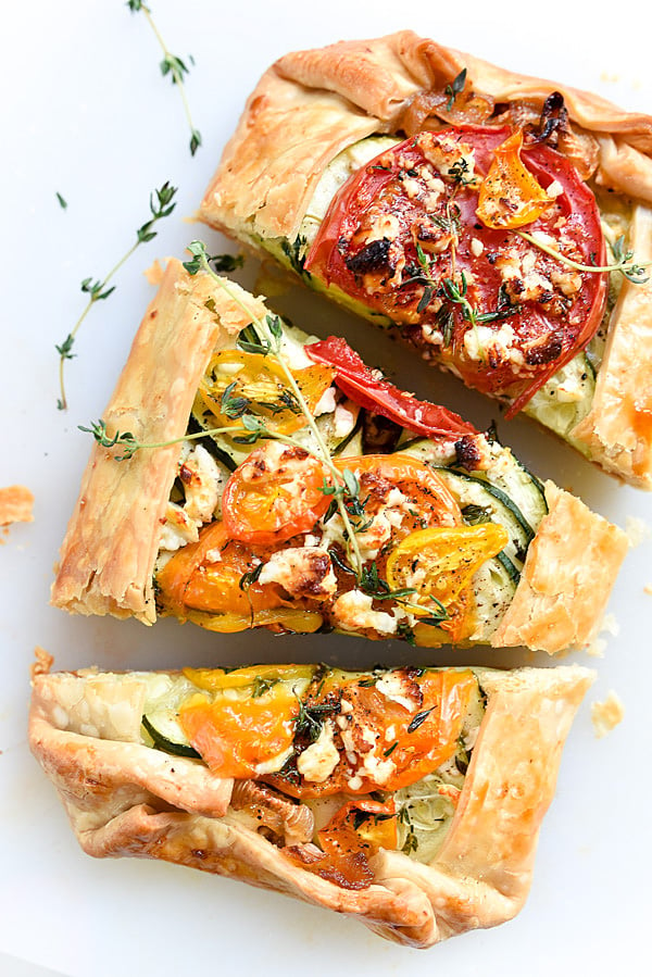 Heirloom Tomato, Zucchini, Caramelized Onion and Feta Galette | foodiecrush.com #summer #heirloom #recipe #piecrusts #cheese
