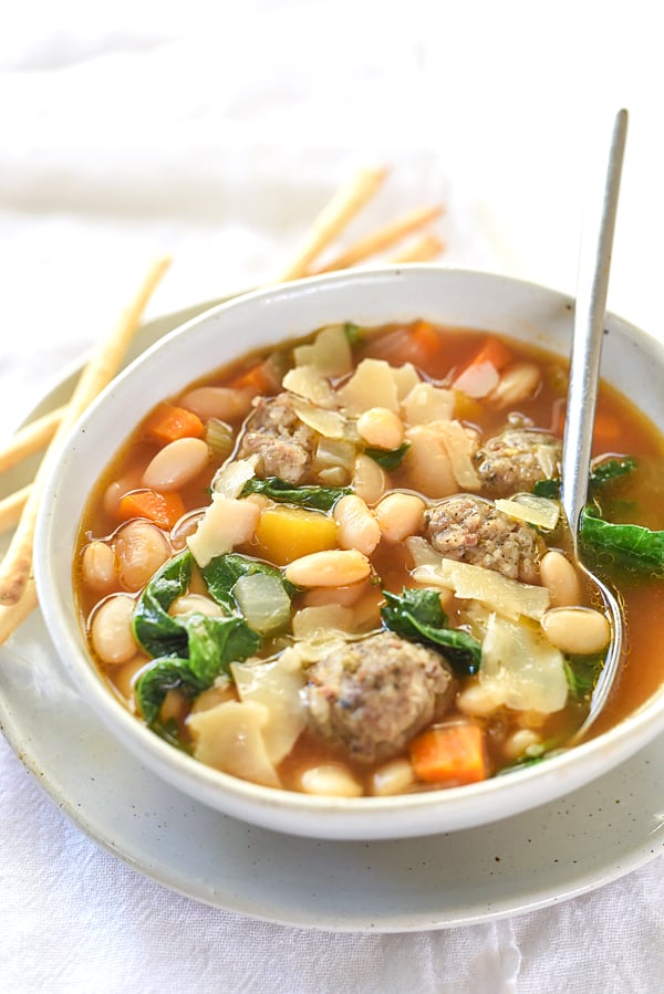 Slow Cooker Tuscan White Bean Soup | foodiecrush.com #withkale #crockpot #slowcooker #spinach #withsausage #recipe