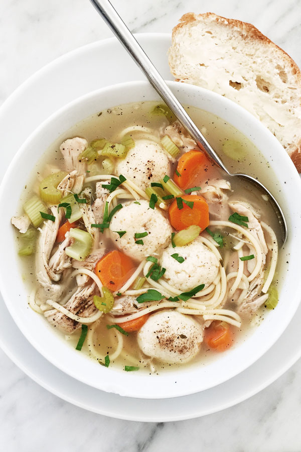 Chicken Noodle Matzo Ball Soup is the best homemade dinner to make anyone feel better | foodiecrush.com