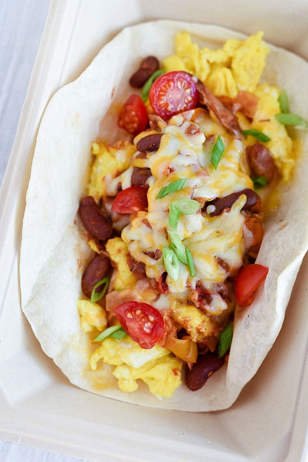 Scrambled eggs wrapped in a burrito and topped with chili and cheese are just one way to put your leftovers to work | foodiecrush.com 