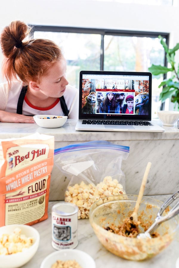 Loaded Monster Cookies pack in all the flavors with whole wheat pastry flour, nuts and coconut. And don't forget the chocolate for a healthy twist on dessert | foodiecrush.com