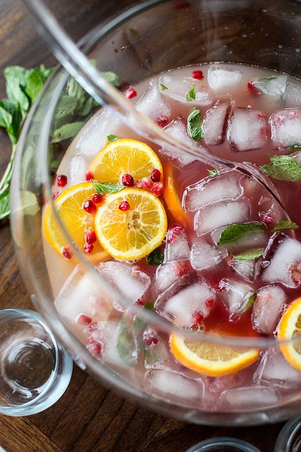 Pomegranate and Orange Champagne Punch is a fancy looking but totally easy punch for a crowd. | foodiecrush.com