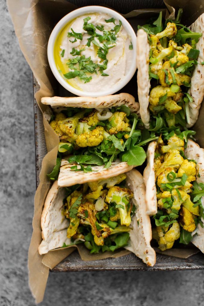 Curried Cauliflower Wrap from Naturally Ella on foodiecrush.com 