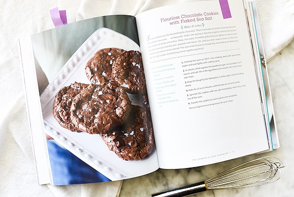 Cookies & Cups cookbook open to recipe for flourless cookies