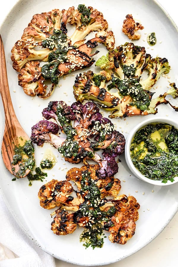 Grilled Cauliflower Steaks with Asian Gremolata for a veggie spin on grilling steaks | #steak #recipes #head #healthy foodiecrush.com