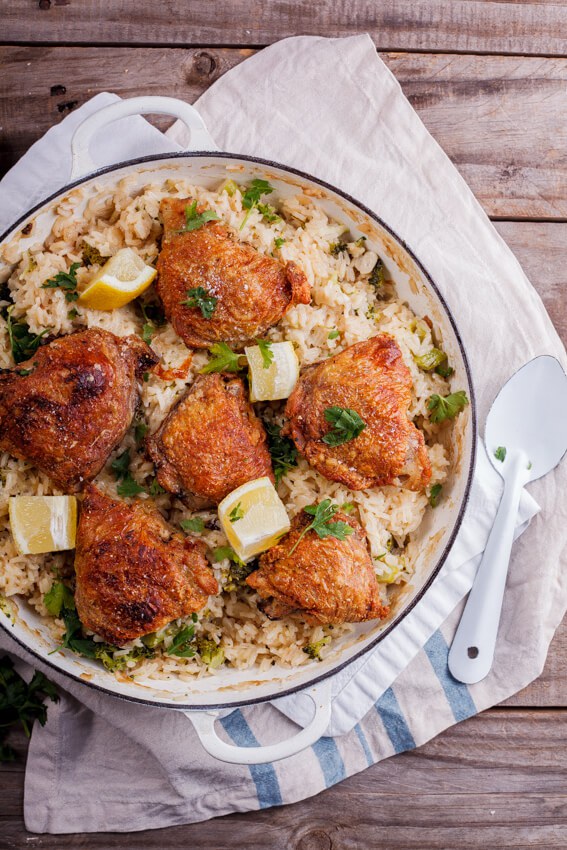 Crispy Chicken Thighs on Cheesy Broccoli Rice from simply-delicious-food.com on foodiecrush.com