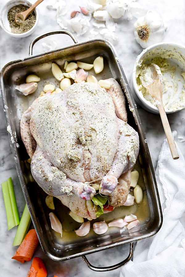 unbaked oven roasted whole chicken ready for the oven