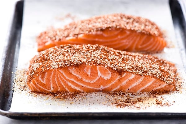 uncooked maple glazed salmon on baking tray