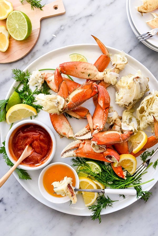 The Easiest Whole Dungeness Crab Recipe with Citrus Butter | #howtocook #boil #recipes #dinner #howtoeat foodiecrush.com