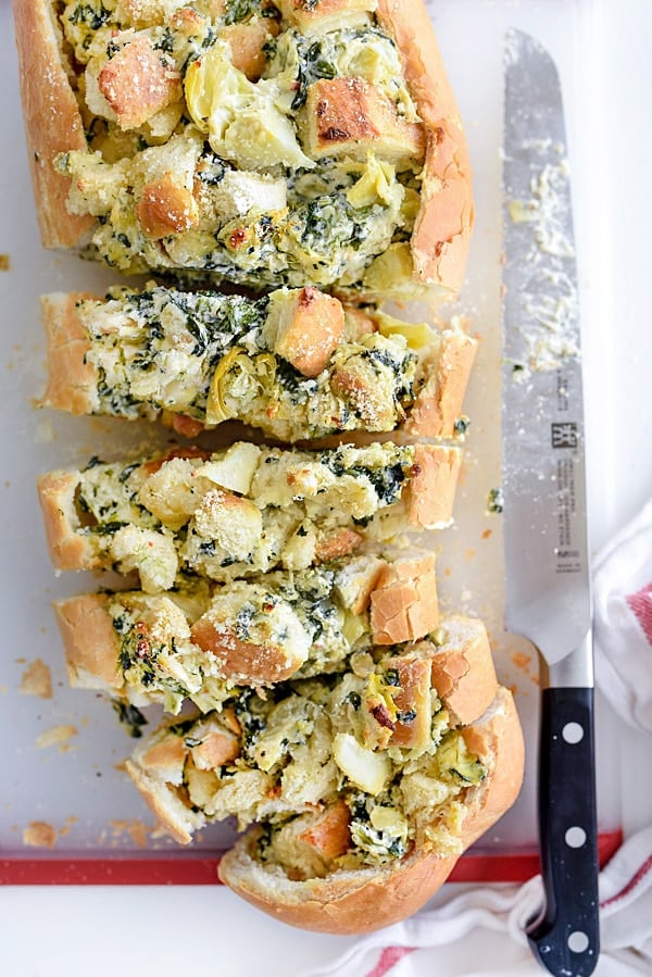 Spinach Artichoke Stuffed Bread | #stuffed #pullapart #dip #boat #creamcheese foodiecrush.com