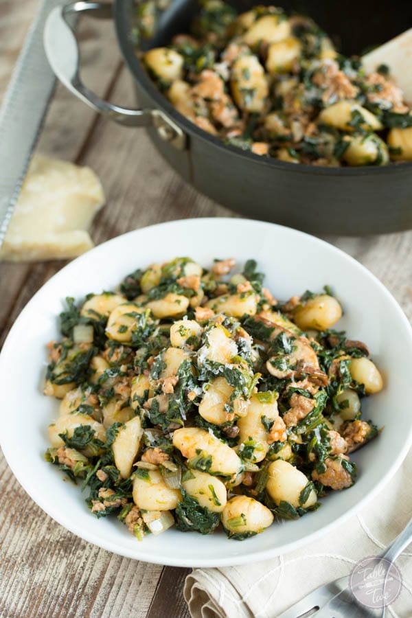 Spicy Sausage, Spinach, and Mushroom Gnocchi from tablefortwoblog.com on foodiecrush.com