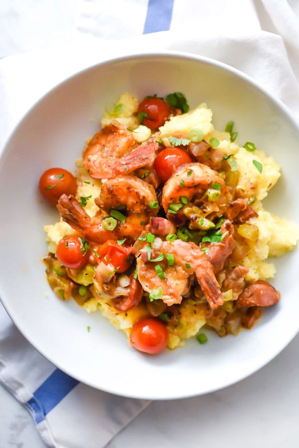 homemade shrimp and grits in white bowl