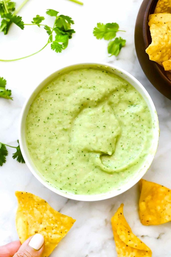 Creamy Avocado Salsa Verde in a white bowl