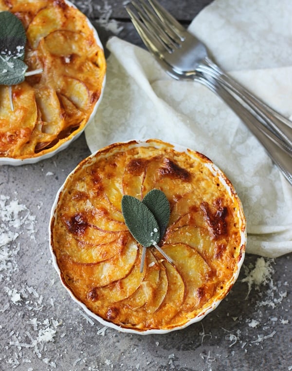 Individual Pumpkin and Potato Gratins with Gruyere and Sage from cookingforkeeps.com on foodiecrush.com