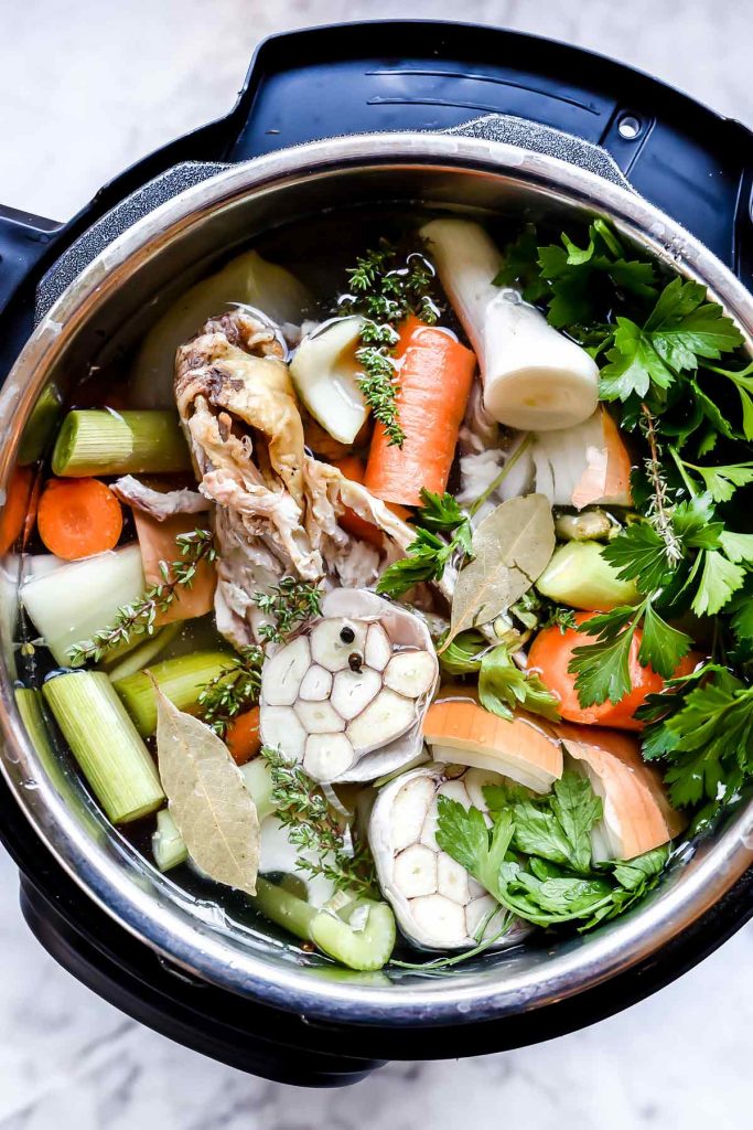 How to Make Homemade Chicken Stock and Broth in the Instant Pot pressure cooker or in a slow cooker | foodiecrush.com #chicken #stock #broth #recipe #recipeoftheday