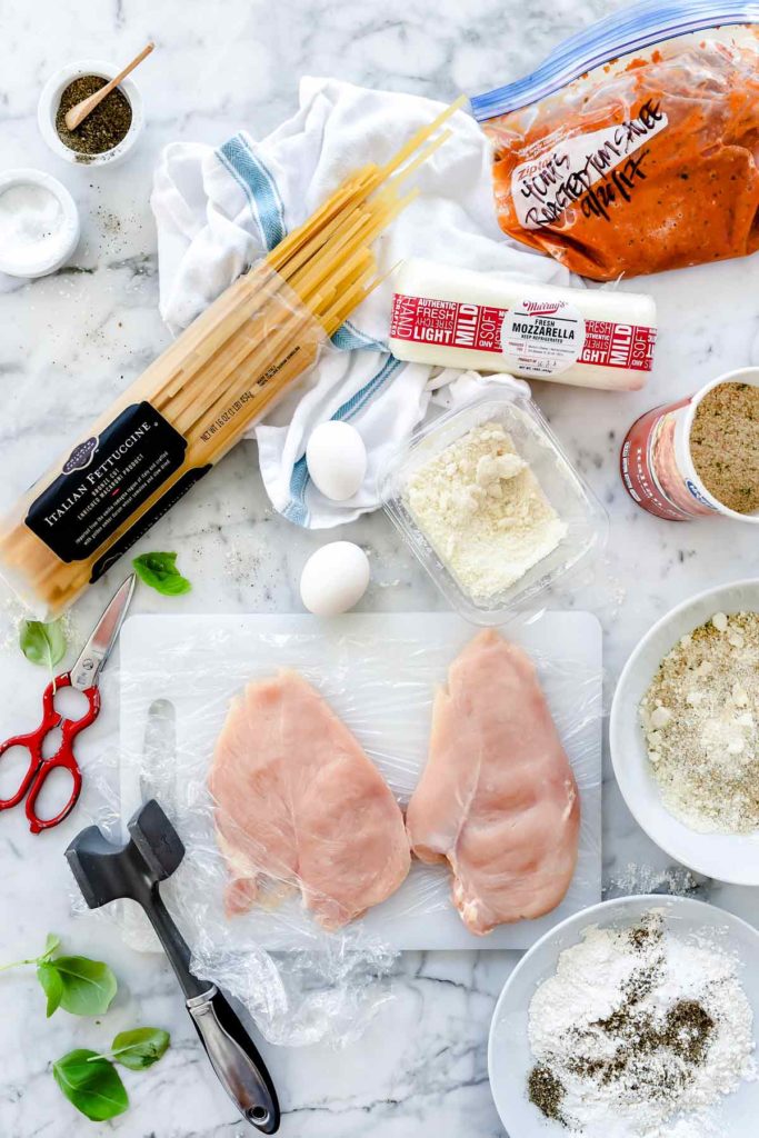 best chicken parmesan ingredients on marble countertop