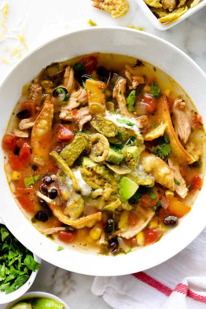 bowl of the best chicken tortilla soup with toppings