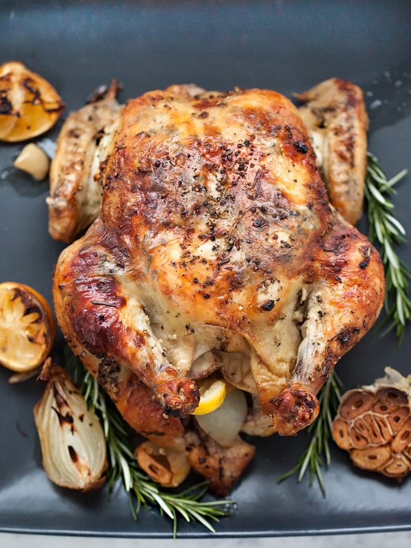 Oven Roasted Chicken with Lemon Rosemary Garlic Butter from foodiecrush.com on foodiecrush.com