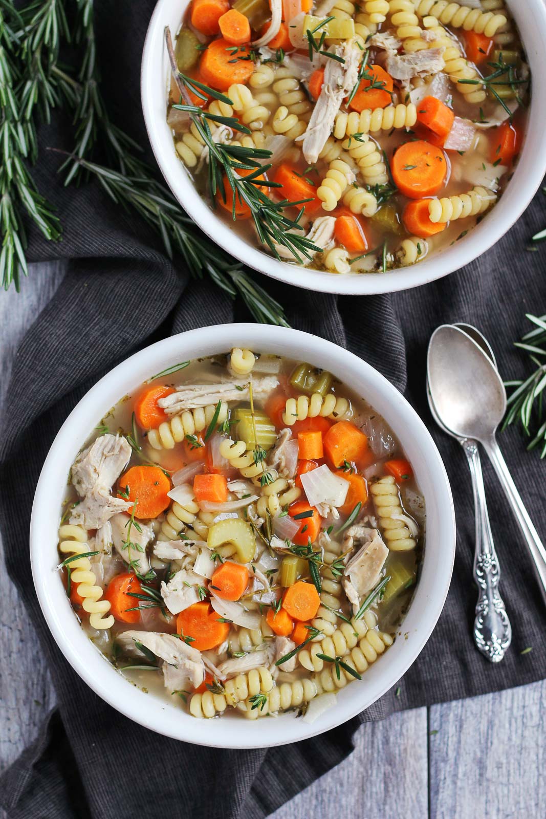 Comforting & Healthy Slow Cooker Chicken Noodle Soup (with a hint of lemon & rosemary) from ambitiouskitchen.com on foodiekitchen.com