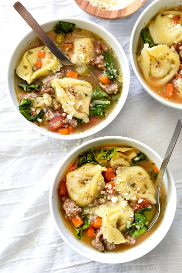 Slow Cooker Tortellini Soup with Sausage and Kale from foodiecrush.com on foodiecrush.com