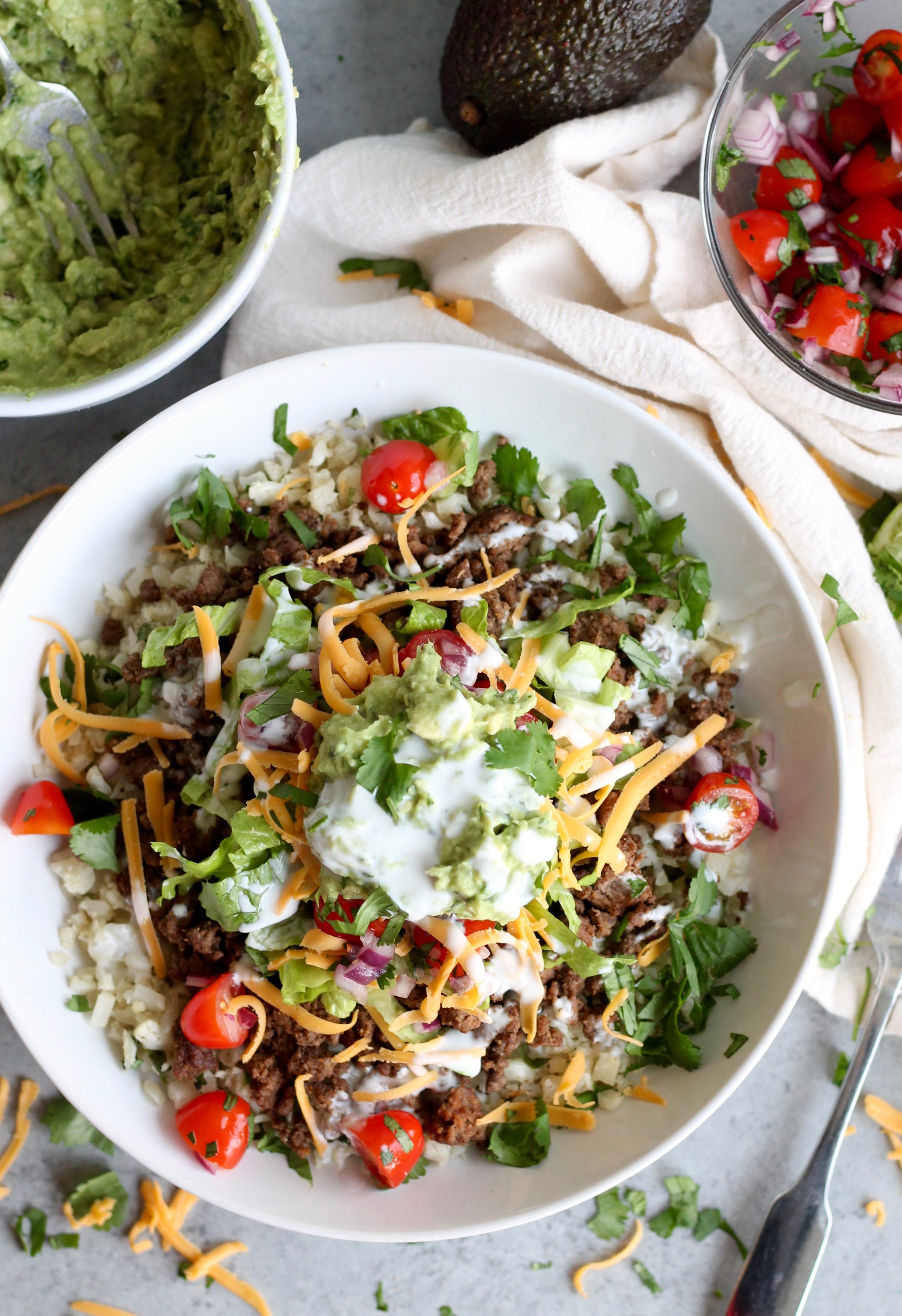 Beef Burrito Bowls with Cilantro Lime Cauliflower Rice from spicesinmydna.com on foodiecrush.com