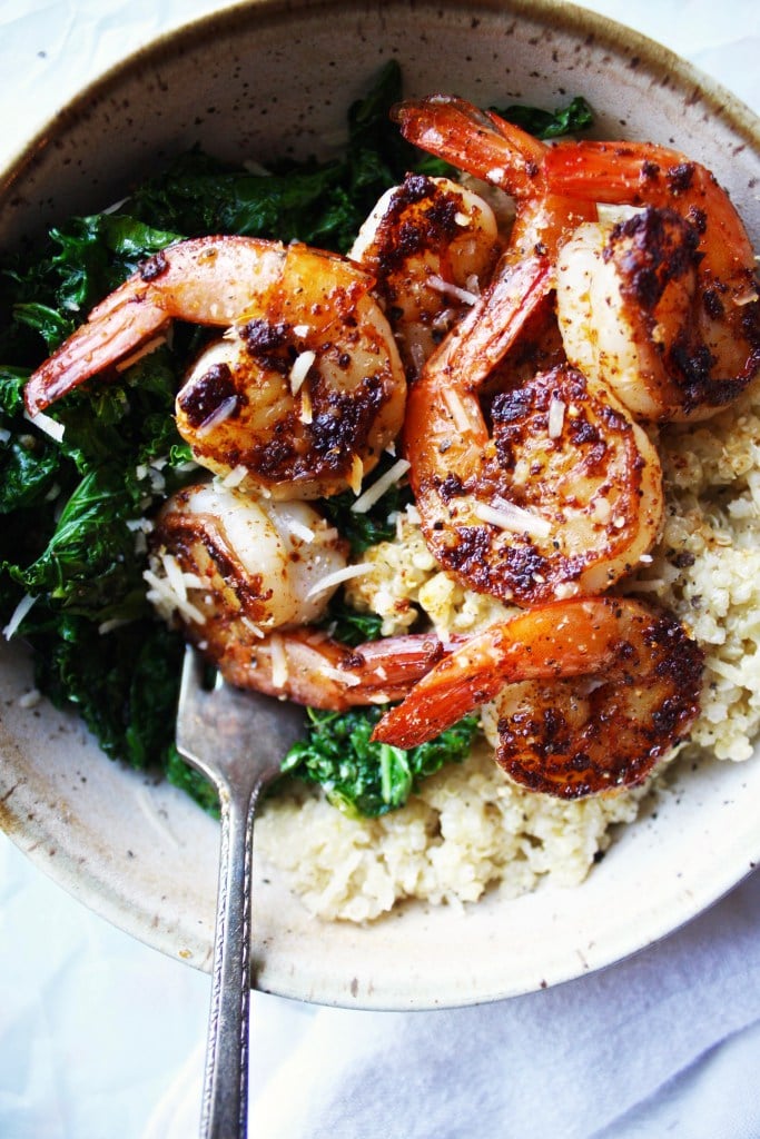 Spicy Shrimp Bowls with Parmesan Quinoa and Garlic Kale from thegarlicdiaries.com on foodiecrush.com