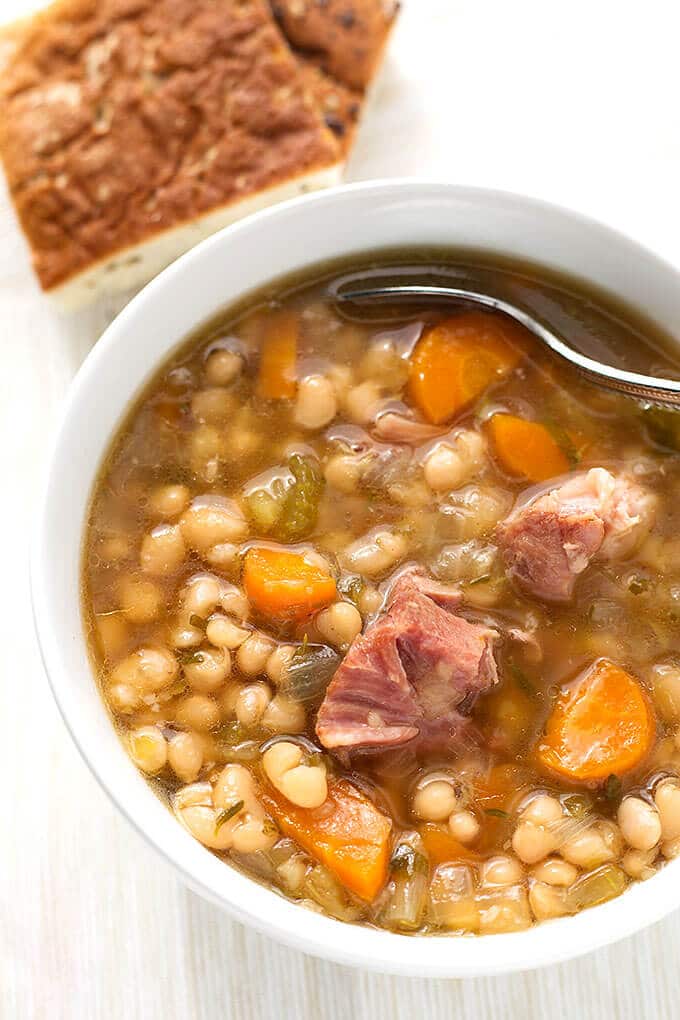 Instant Pot Ham Hock and Bean Soup from simplyhappyfoodie.com on foodiecrush.com