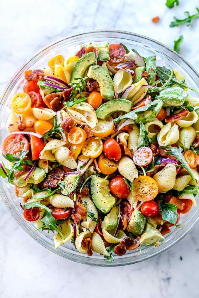 BLT pasta salad in glass serving bowl