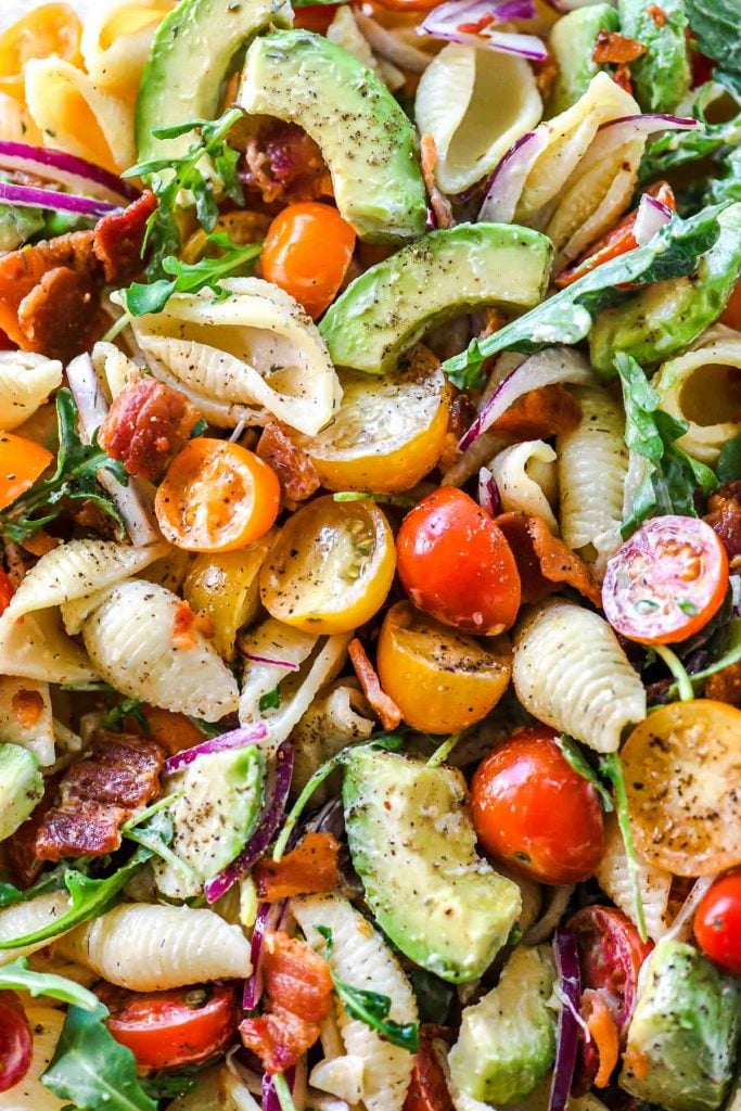 close up of avocado and bacon pasta salad