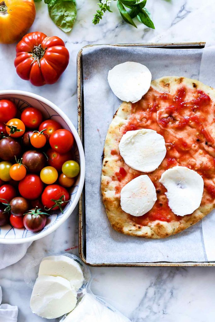 Mozzarella and Tomato Caprese Flatbread Ingredients | foodiecrush.com #flatbread #pizza #tomato #mozzarella #appetizer #recipes #dinner