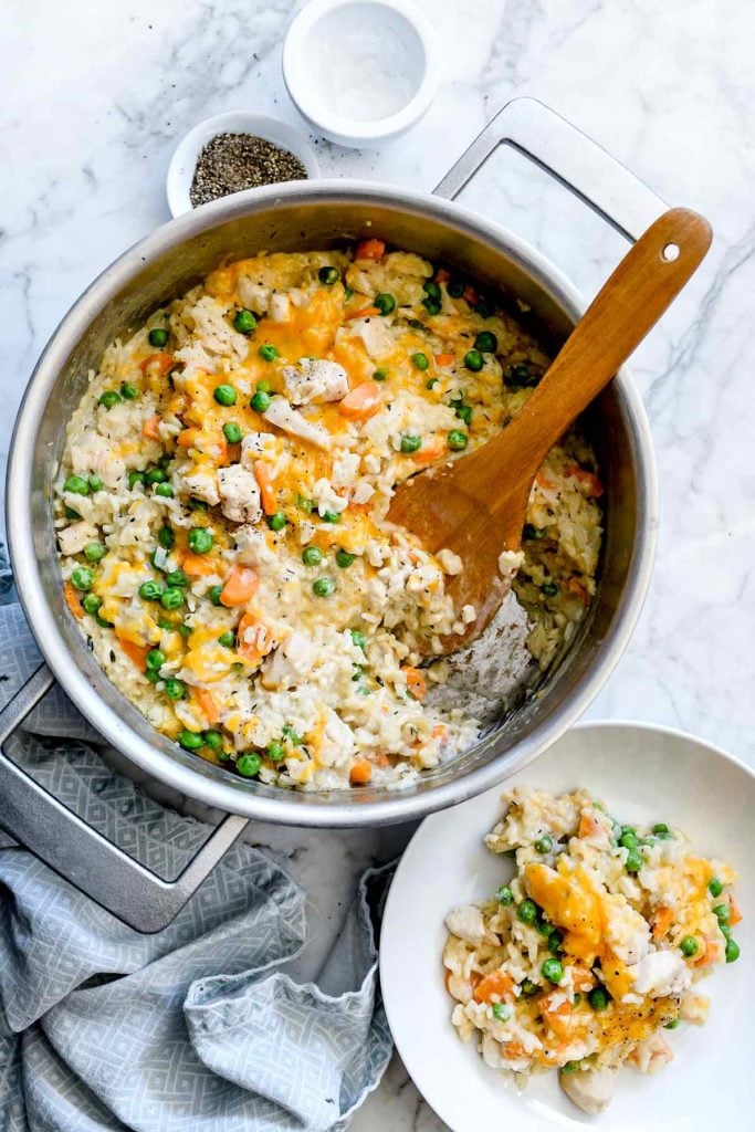 One Pot Chicken and Rice Casserole with wooden spoon