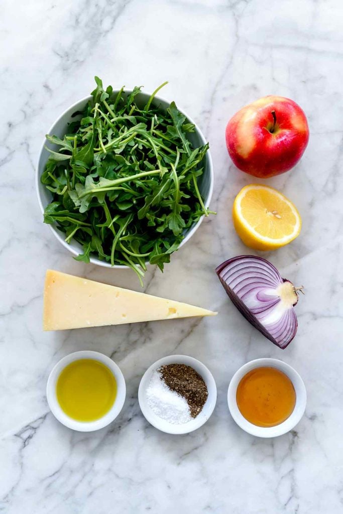 Ingredients needed to make arugula lemon parmesan salad