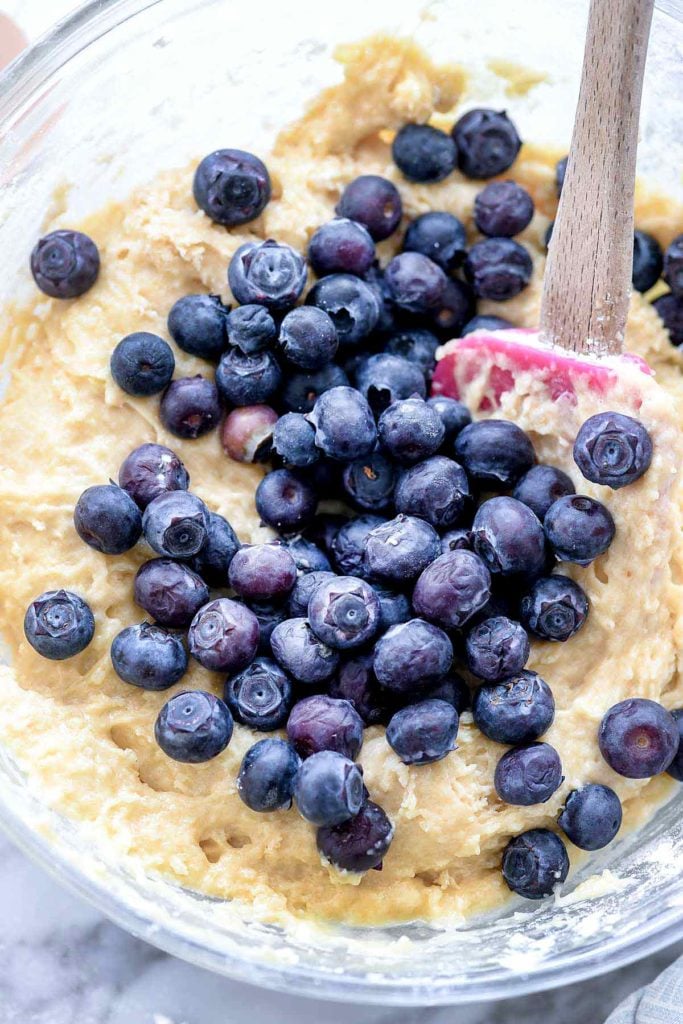 making blueberry muffin batter