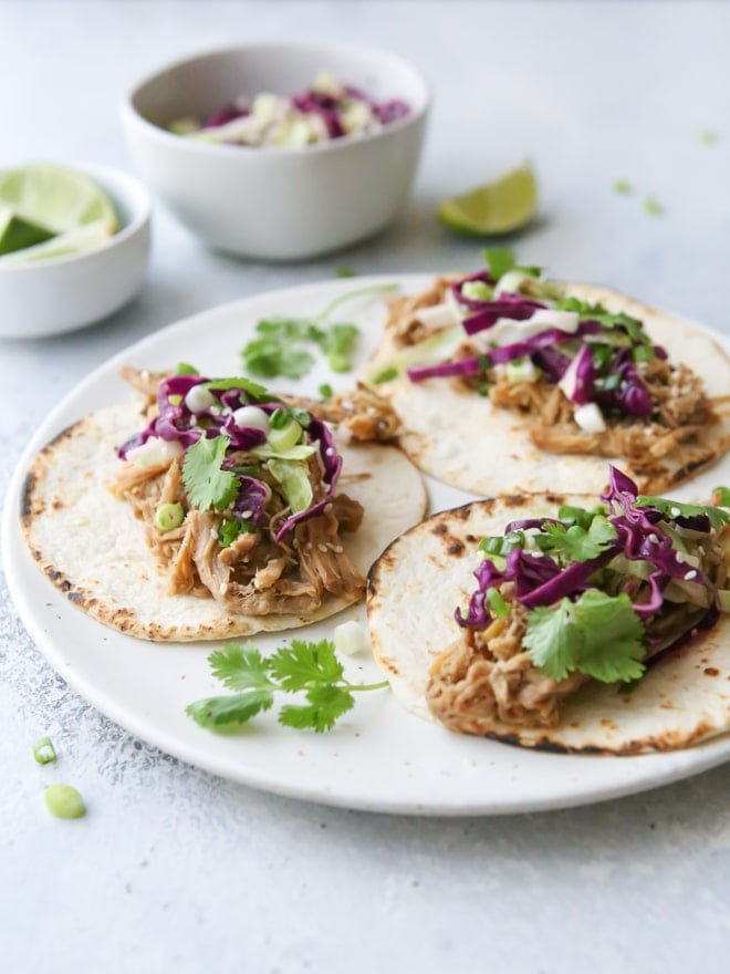 Slow Cooker Korean Pork Tacos from Completely Delicious on foodiecrush.com