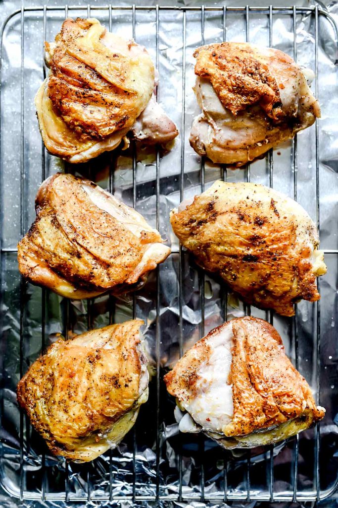 Chicken Thighs on baking rack | foodiecrush.com