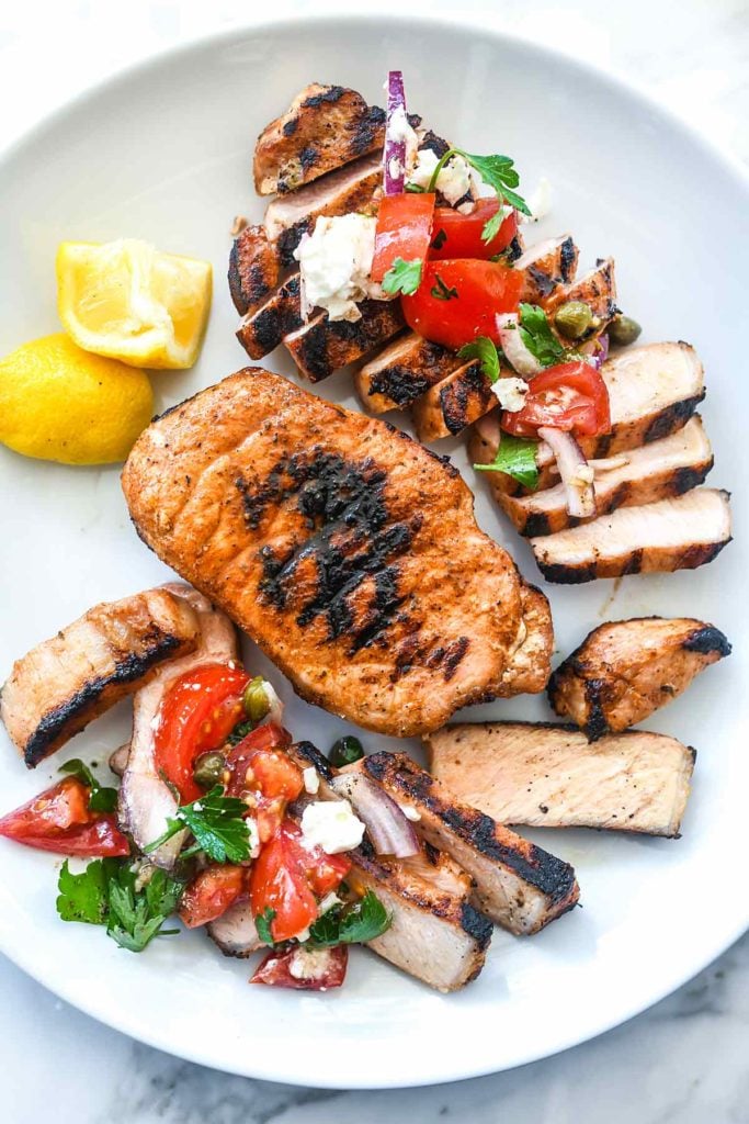 Mediterranean Grilled Pork Chops with Tomato Salad | foodiecrush.com #grilled #porkchops #recipes #dinner