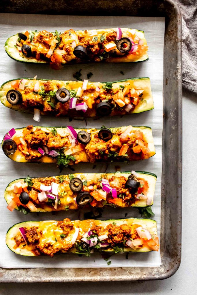 Taco Zucchini Boats from Platings + Pairings on foodiecrush.com