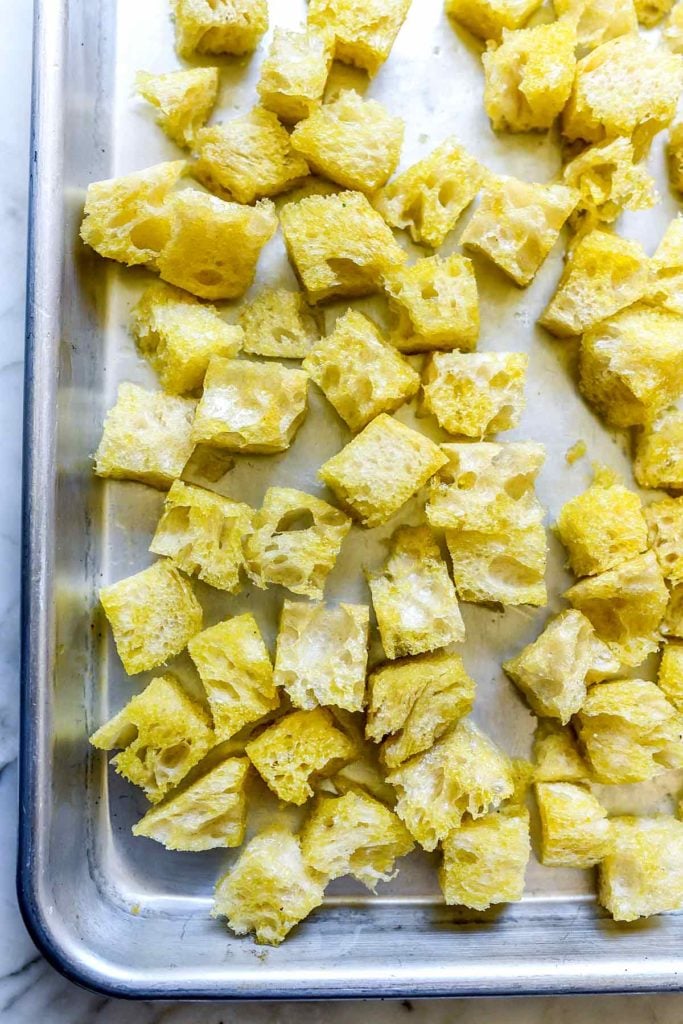 Bread cubes on baking sheet foodiecrush.com