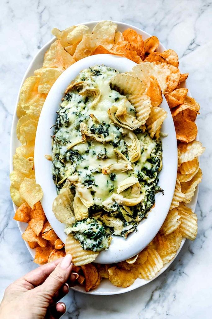 Easy Baked Spinach Artichoke Dip with Kettle Chips | foodiecrush.com